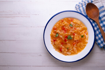 Menorcan soup. Traditional recipe from the island of Menorca in the Balearic Islands. Traditional tapas from the islands with bread, peppers and white cabbage.