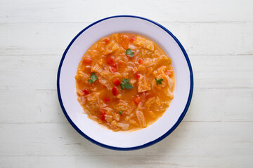 Menorcan soup. Traditional recipe from the island of Menorca in the Balearic Islands. Traditional tapas from the islands with bread, peppers and white cabbage.