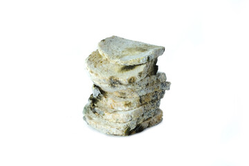 Fungus on bread slides vertically on the floor, white liang health concept.
