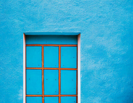 Door on a blue facade, minimalist, traditional architecture and decoration xxxxx, 3D rendering