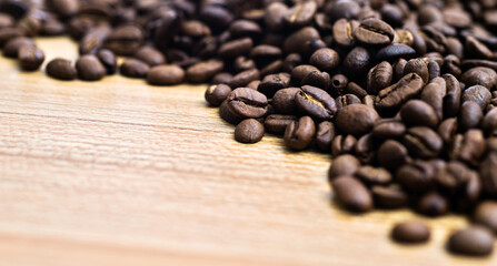 Coffee beans on wooden table