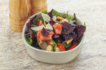 Mix salad with salmon, corn and tomato