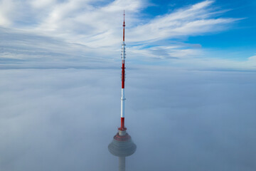 Aerial autumn beautiful morning fog view of Vilnius TV Tower, Lithuania