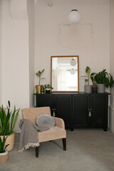 Bathroom interior with black chest of drawers
