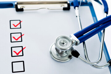 Clipboard with checklist and stethoscope