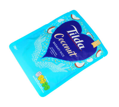 Tilda steamed coconut basmati rice with no added salt in a microwaveable 250g pouch