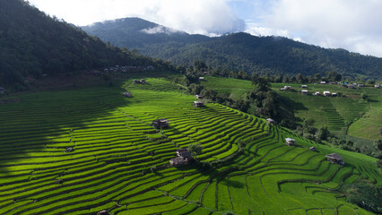 Aerial views beautiful of Small house and rice terraces field at pabongpaing village rice terraces Mae-Jam Chiang mai, Thailand. local organic natural travel.