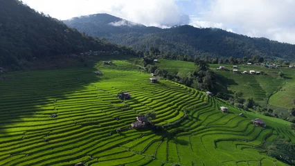 Foto auf Leinwand Aerial views beautiful of Small house and rice terraces field at pabongpaing village rice terraces Mae-Jam Chiang mai, Thailand. local organic natural travel. © APHIRAK