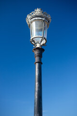 Fototapeta na wymiar Victorian streetlight against sky