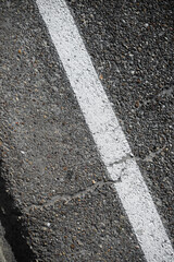 Fototapeta premium Roadside with a white painted line