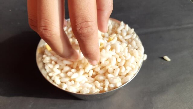 Puffed rice or&nbsp;popped rice. Its puffed grain&nbsp;made from&nbsp;rice. A breakfast cereals&nbsp;and other snack foods. Traditional methods to puff or pop rice frying in&nbsp;oil, sand and salt. Murmura, roasted grain.
