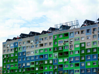 green and blue exterior elevation of insulated concrete panel residential apartment building in...