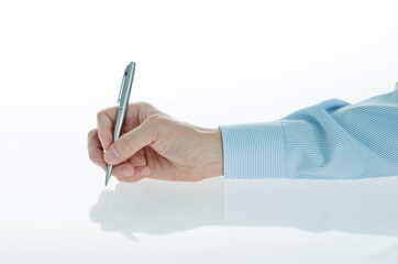 Businessman hand holding a pen on white background