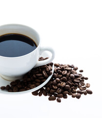 Coffee cup and beans isolated on white background