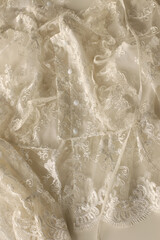 Obraz premium White summer sweater with mesh and buttons.