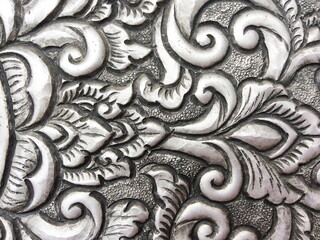 Fototapeta na wymiar The art and pattern of carving silverware.