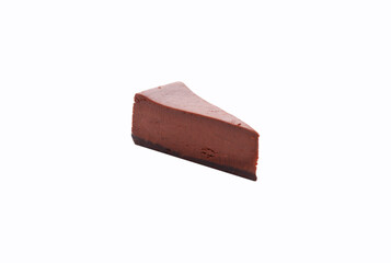 A piece of chocolate cake. Isolated on white.