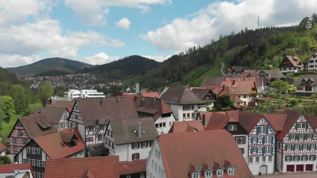 Aerial view of typical half-timbered german houses in village among valley (Schiltach, Black Forest)