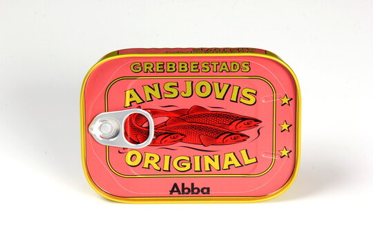 Riga, Latvia, October 26, 2022: Anchovies in a red metal can, canned fish