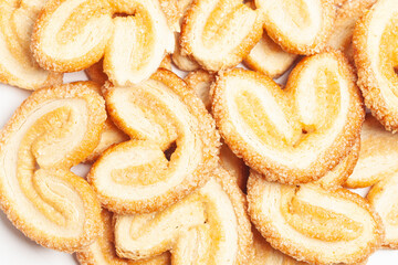 Heart-shaped cookies top view background