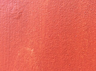 Texture concrete painted with red paint