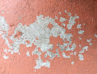 Old wall background - city building decay texture. Urban decline pattern with peeling paint.