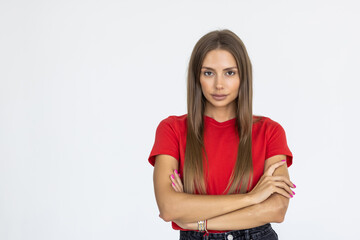 Obraz premium Portrait of young caucasian woman cross arms on chest, smile from joy, laughing and looking at right side copy space or logo, standing against white background