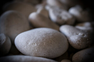 Fototapeta na wymiar White pebble stones on the beach of Myrtos