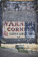 Old grocers sign in London
