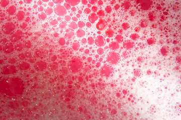 pink bubbles on the water.