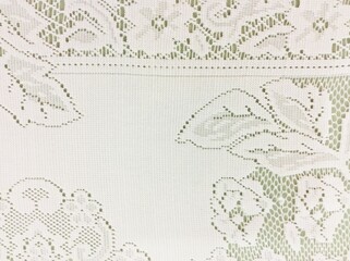 White lace isolated on brown background