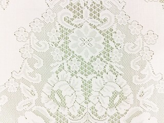 White lace isolated on brown background