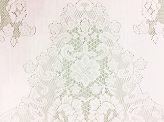 White lace isolated on brown background