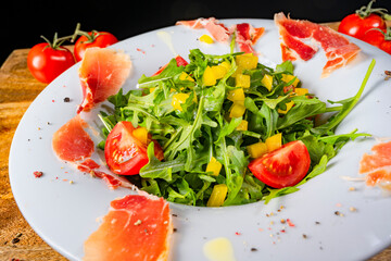 Rocket salad with dried Spanish ham