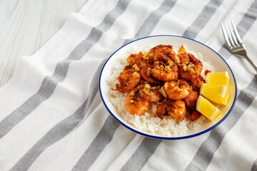 Homemade Hawaiian Garlic Shrimp Scampi on a Plate, side view. Copy space.