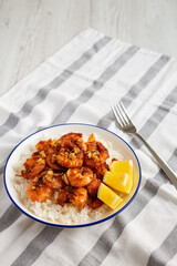 Homemade Hawaiian Garlic Shrimp Scampi on a Plate, side view. Copy space.