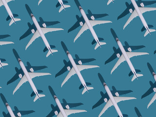 Airplane background. Flights, travel and aviation. Pattern of white planes on a blue background. The passenger plane is flying. Air transport concept.