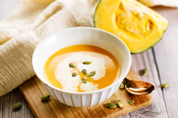 Pumpkin soup with pumpkin seeds and cream