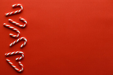 Christmas background with red candy canes.