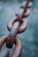 fence with an old  rusty chain 