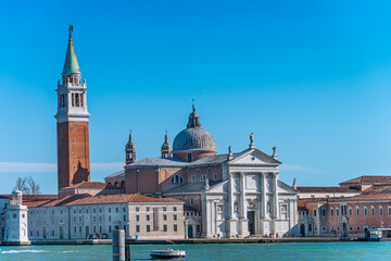 Fototapeta na wymiar San Giorgio Maggiore is a 16th-century Benedictine church, designed by Andrea Palladio, and built between 1566 and 1610. It is a basilica in the classical renaissance style. Venice, 2019