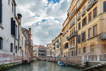 Fototapeta na wymiar Old buildings in the Interior or internal channels in Venice. Italy, 2019