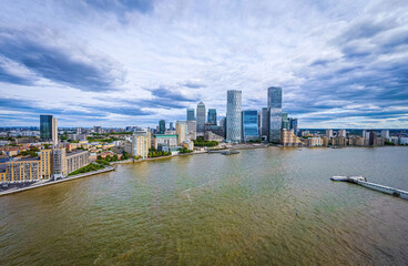 Fototapeta na wymiar Aerial view of skyscrappers of the Canary Wharf, the business district of London on the Isle of Dogs