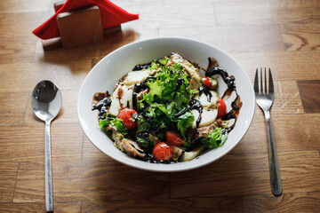 salad warm salad with veal and cheese and tomatoes