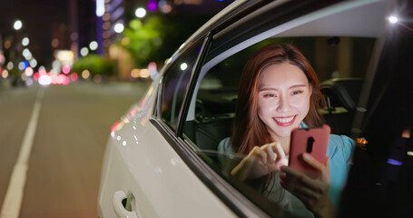 businesswoman use phone in car