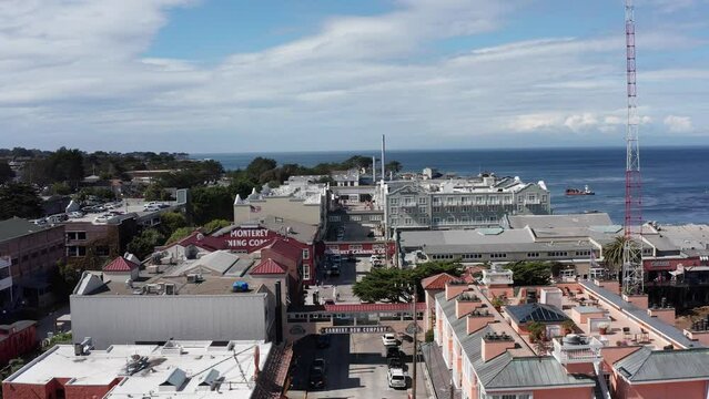 Close-up aerial shot flying over historic Cannery row in Monterey, California. 4K