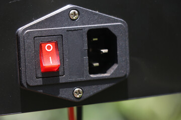 3D Printer power box with a view of its switch and slot for the power plug