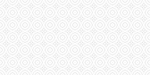 Vector ornamental seamless pattern in traditional arabian, indian, turkish style. Subtle abstract mosaic background texture with stars, floral shapes. Elegant white and gray ornament. Repeat design