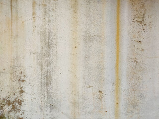 The surface of the cement wall with paint stains from prolonged washing by water