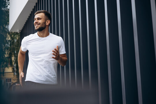Young man jogging in the city